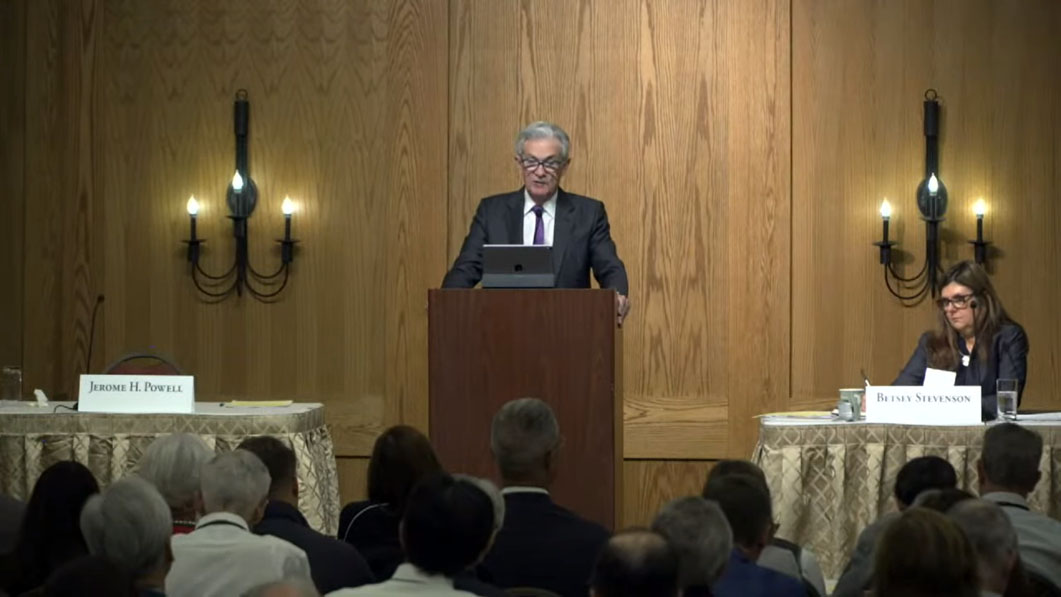 Powell delivering his speech at the symposium